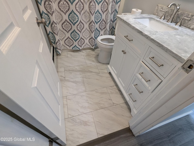 14 W Main St, Fort Plain, NY 13339 - bathroom with marble finish flooring, vanity, toilet, and a shower with shower curtain