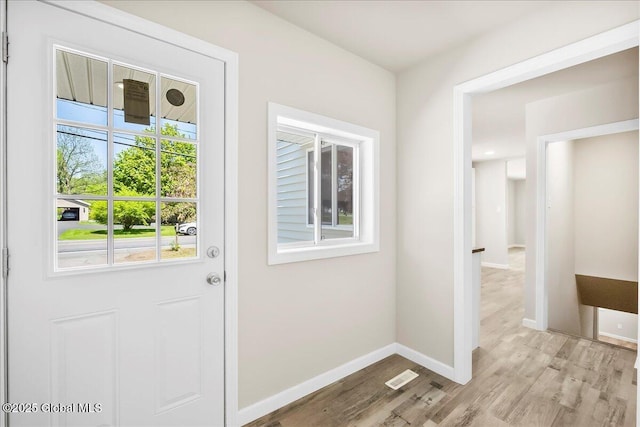 35 Feeder Dam Rd, Moreau, NY 12803 - doorway featuring light wood-style flooring and baseboards