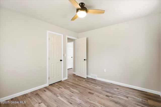 35 Feeder Dam Rd, Moreau, NY 12803 - unfurnished bedroom featuring light wood-style flooring, baseboards, and ceiling fan