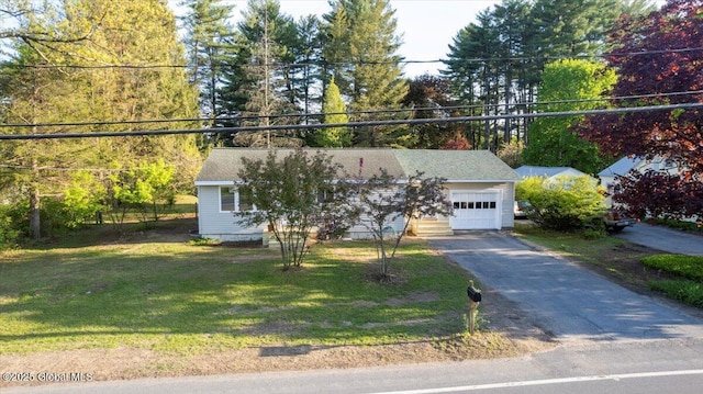 35 Feeder Dam Rd, Moreau, NY 12803 - view of front of house with driveway, a garage, and a front yard