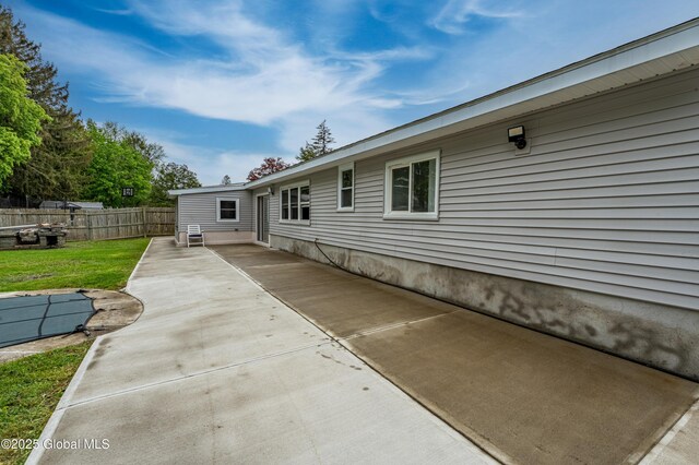 back of property with a patio area