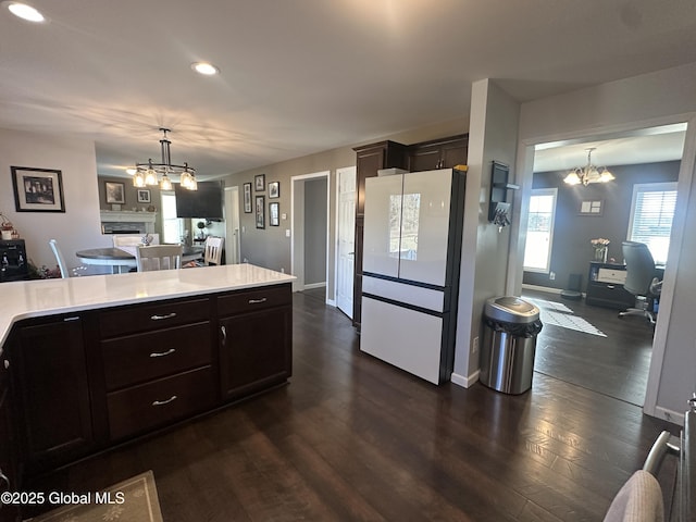23 Line Dr, Brunswick, NY 12180 - kitchen with a chandelier, light countertops, dark wood finished floors, hanging light fixtures, and recessed lighting
