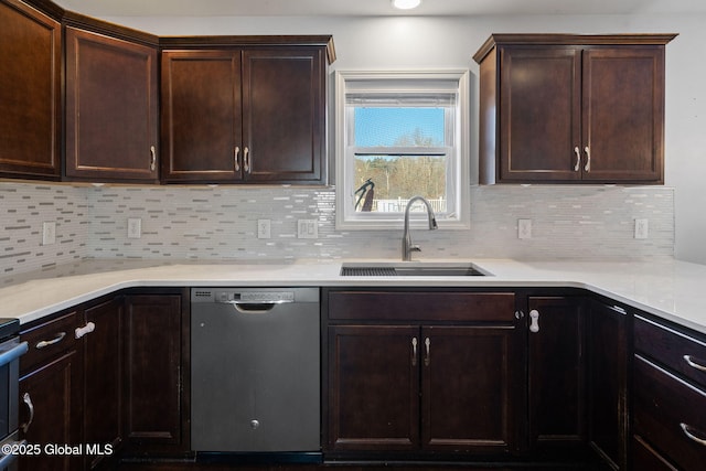 23 Line Dr, Brunswick, NY 12180 - kitchen with stainless steel dishwasher, a sink, dark brown cabinets, and decorative backsplash