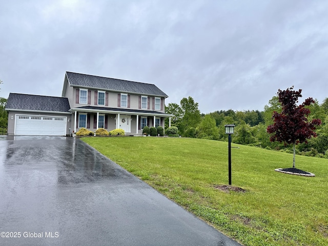 23 Line Dr, Brunswick, NY 12180 - view of front of house featuring a porch, driveway, an attached garage, and a front yard