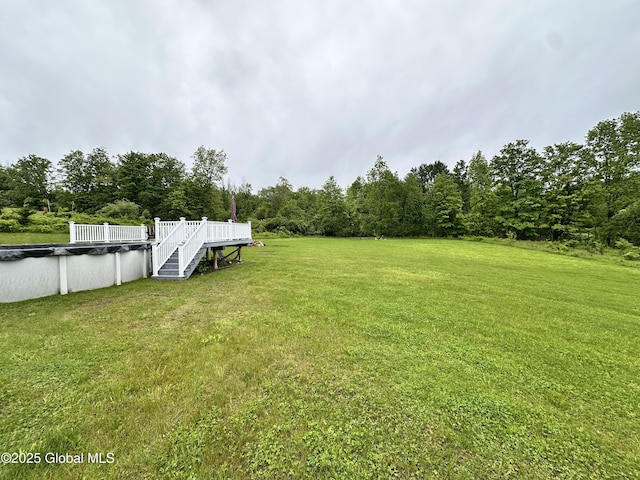23 Line Dr, Brunswick, NY 12180 - view of grassy yard featuring a covered pool and a deck