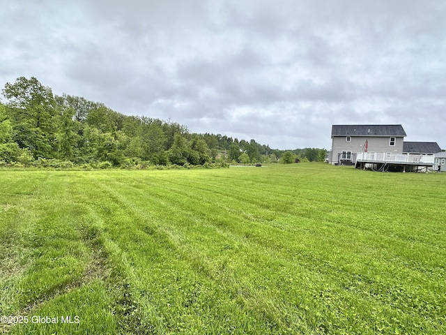 23 Line Dr, Brunswick, NY 12180 - view of green lawn with a wooden deck
