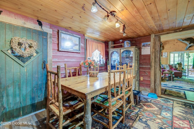 34 Rosebloom Rd, Hadley, NY 12835 - dining room with wood walls, wooden ceiling, and wood finished floors