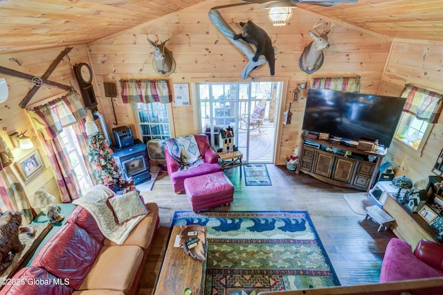 34 Rosebloom Rd, Hadley, NY 12835 - living room featuring vaulted ceiling, wooden ceiling, wood walls, and hardwood / wood-style flooring
