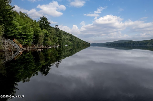 34 Rosebloom Rd, Hadley, NY 12835 - water view featuring a mountain backdrop and a heavily wooded area
