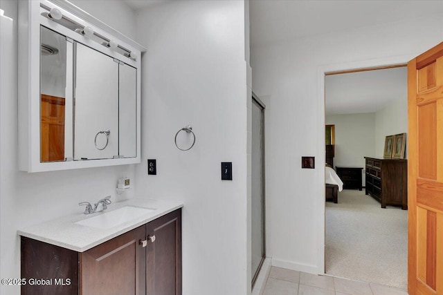 15 Westcrest Dr, Clifton Park, NY 12065 - bathroom featuring a stall shower, vanity, ensuite bath, and tile patterned flooring