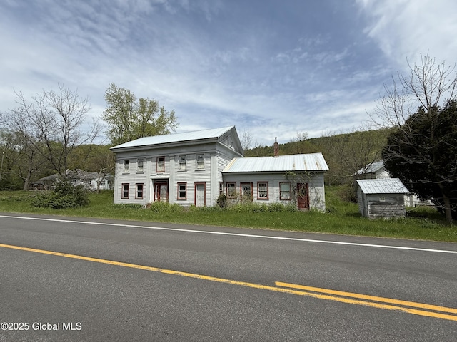 3306 Rte 145, Rensselaerville, NY 12469 - view of front of home featuring metal roof