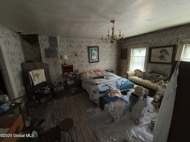 3306 Rte 145, Rensselaerville, NY 12469 - bedroom featuring wallpapered walls and a chandelier