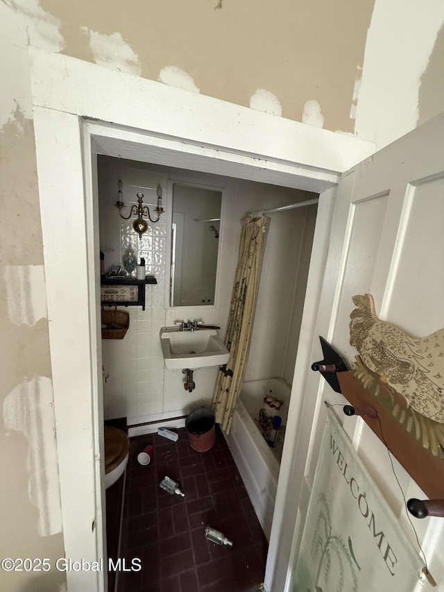 3306 Rte 145, Rensselaerville, NY 12469 - bathroom featuring shower / bathtub combination with curtain and a sink