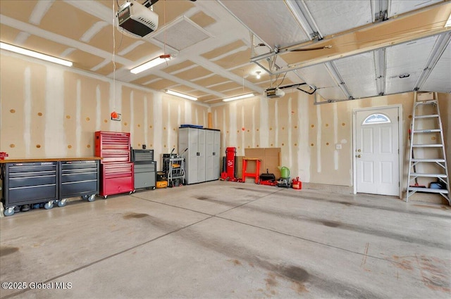 garage featuring a garage door opener