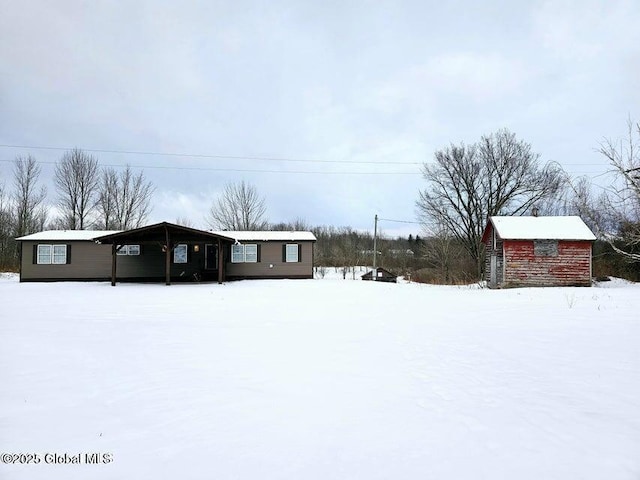 view of yard covered in snow