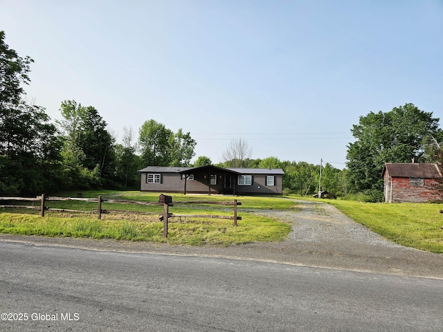 1714 Latimer Hill Rd, Root, NY 13317 - single story home with gravel driveway
