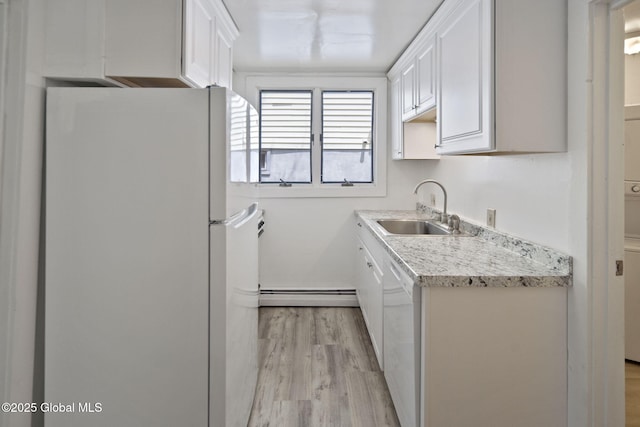 821 7th St, Rensselaer, NY 12144 - kitchen featuring white appliances, a sink, a baseboard radiator, light wood-style flooring, and white cabinets