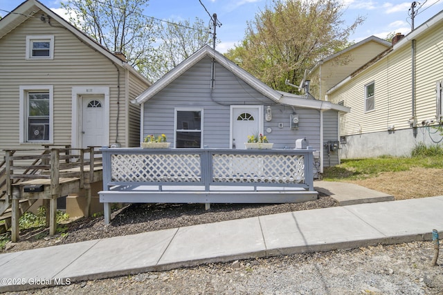 821 7th St, Rensselaer, NY 12144 - shotgun-style home with a deck