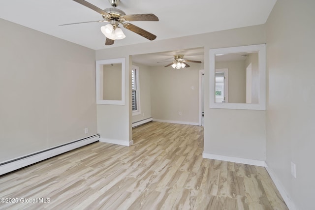 821 7th St, Rensselaer, NY 12144 - empty room with a baseboard radiator, a ceiling fan, baseboards, wood finished floors, and baseboard heating