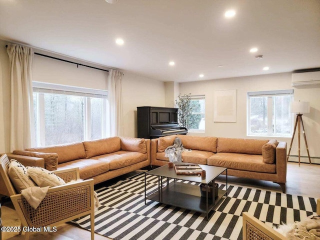 177 Glen Lake Rd, Queensbury, NY 12845 - living area featuring a wall mounted AC, recessed lighting, wood finished floors, and baseboard heating