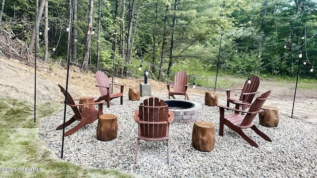177 Glen Lake Rd, Queensbury, NY 12845 - view of patio / terrace featuring a fire pit and a forest view
