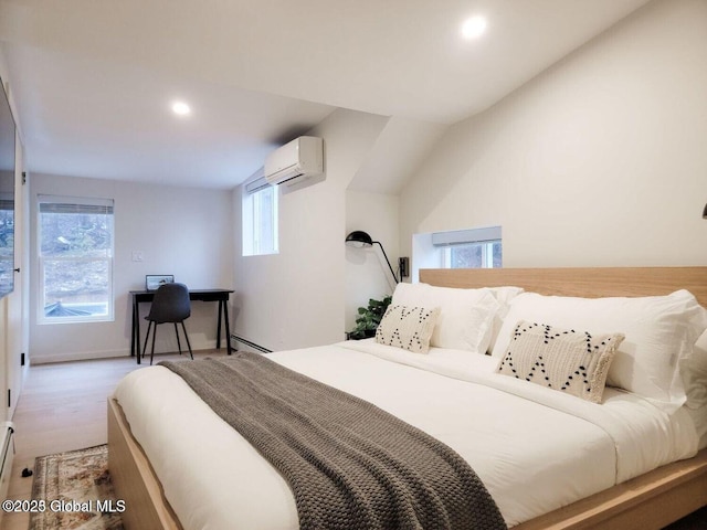 177 Glen Lake Rd, Queensbury, NY 12845 - bedroom with a wall unit AC, a baseboard heating unit, recessed lighting, and wood finished floors