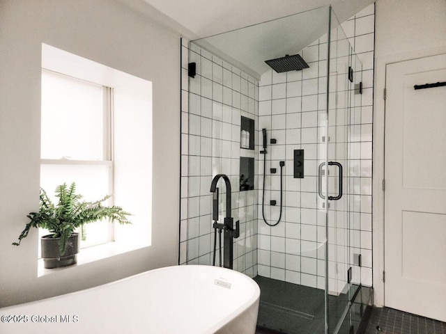 177 Glen Lake Rd, Queensbury, NY 12845 - full bathroom featuring a freestanding tub, healthy amount of natural light, and a stall shower