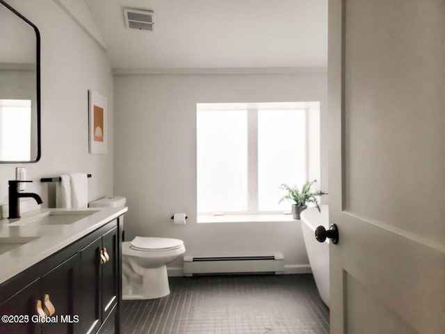 177 Glen Lake Rd, Queensbury, NY 12845 - bathroom with a baseboard heating unit, toilet, tile patterned floors, and vanity