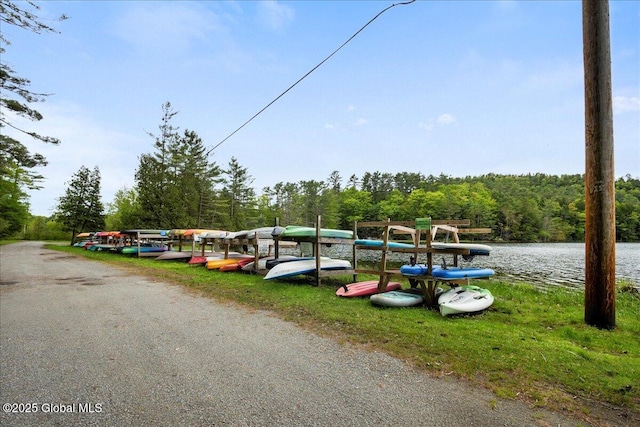 1 High Pines Ter Unit 1C, Chester, NY 12817 - view of car parking with a water view and a view of trees