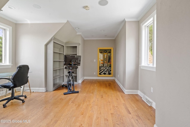 office featuring healthy amount of natural light, light wood finished floors, baseboards, ornamental molding, and recessed lighting