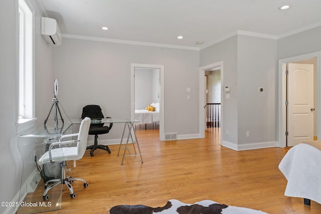 office area with a wall mounted air conditioner, ornamental molding, light wood finished floors, baseboards, and recessed lighting