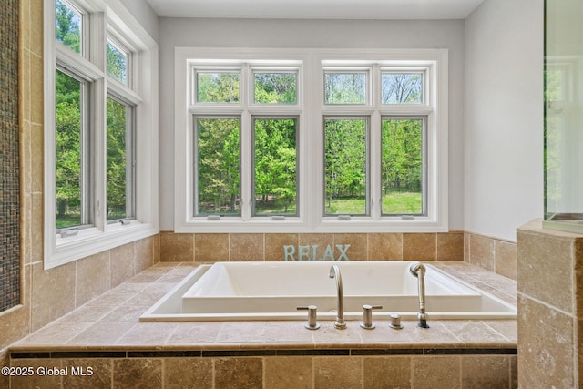 bathroom with a garden tub