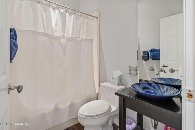 bathroom with toilet and shower / bath combination with curtain