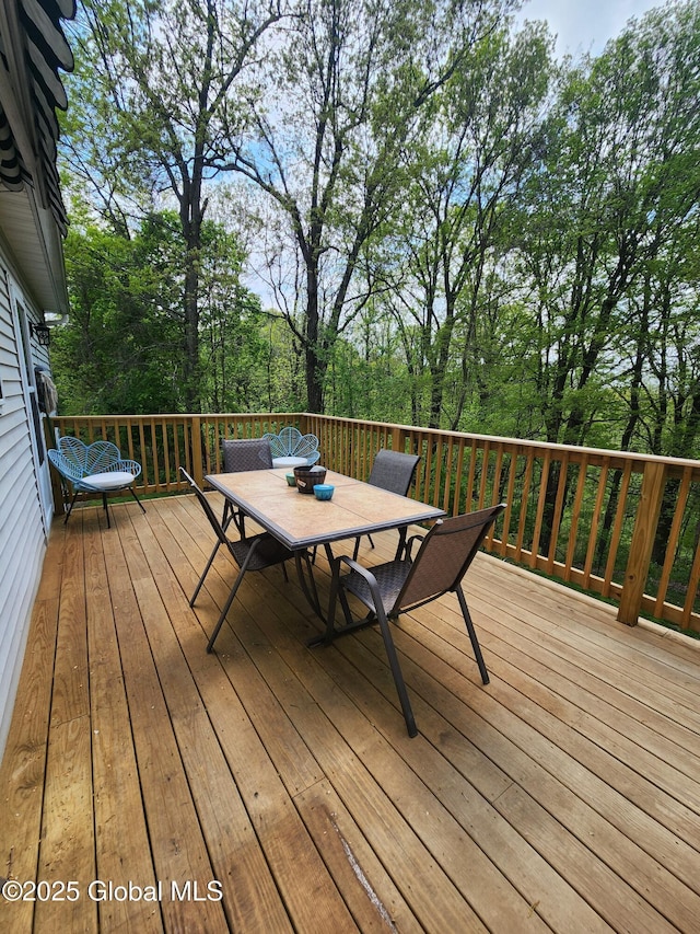deck featuring outdoor dining space