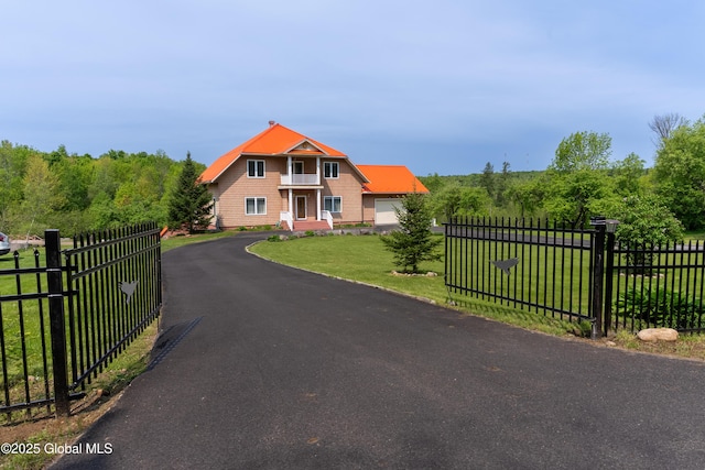 1435 Webster St, Malone, NY 12953 - view of front of property with a balcony and asphalt driveway