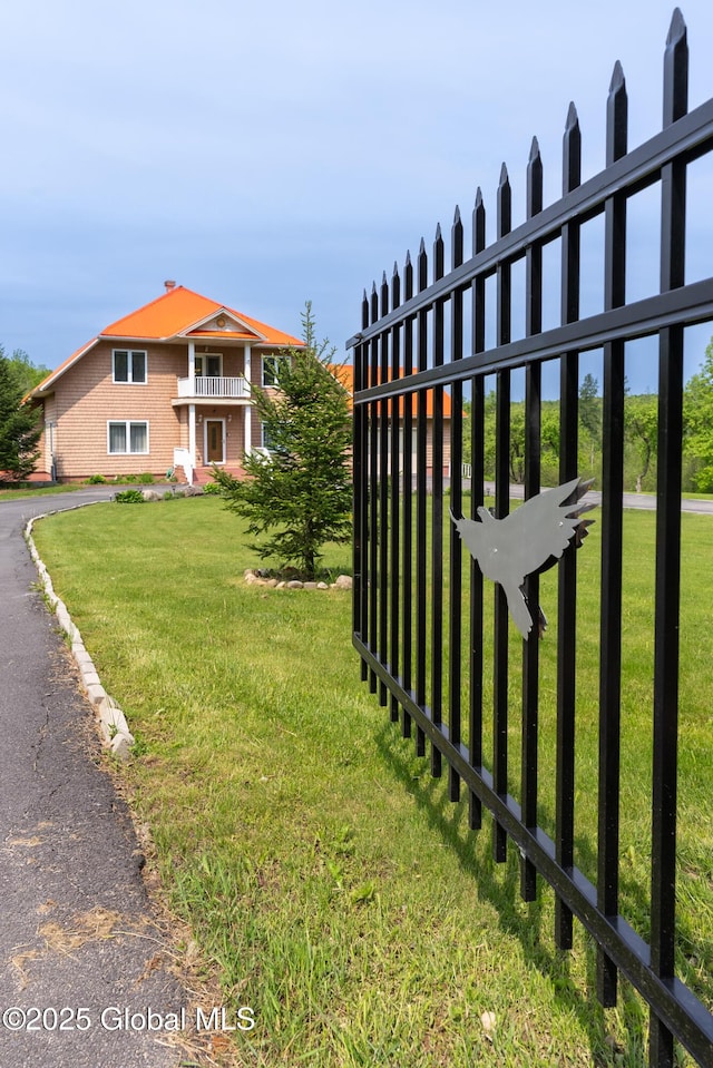 1435 Webster St, Malone, NY 12953 - view of grassy yard featuring a balcony