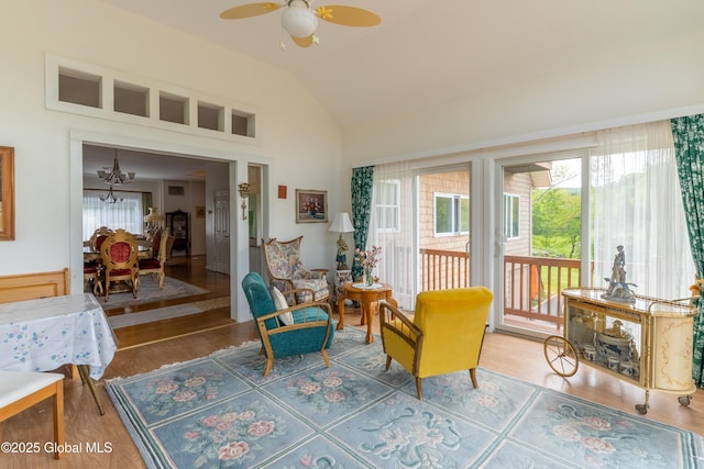 1435 Webster St, Malone, NY 12953 - sitting room with lofted ceiling, a chandelier, wood finished floors, and ceiling fan