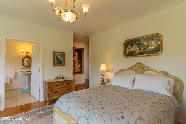 1435 Webster St, Malone, NY 12953 - bedroom featuring a chandelier, ornamental molding, wood finished floors, and ensuite bathroom