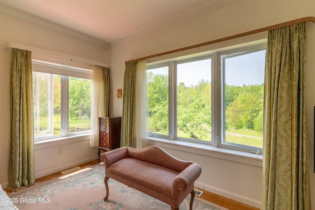1435 Webster St, Malone, NY 12953 - sitting room featuring baseboards and crown molding