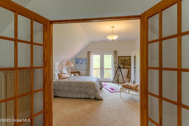 1435 Webster St, Malone, NY 12953 - carpeted bedroom featuring lofted ceiling, french doors, and access to exterior
