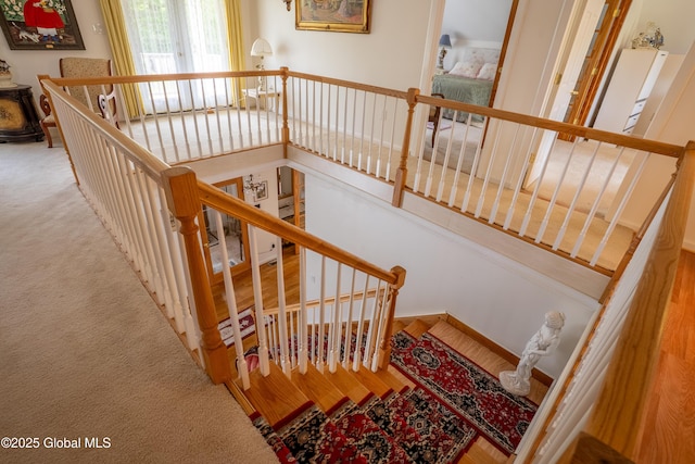1435 Webster St, Malone, NY 12953 - stairway with carpet flooring