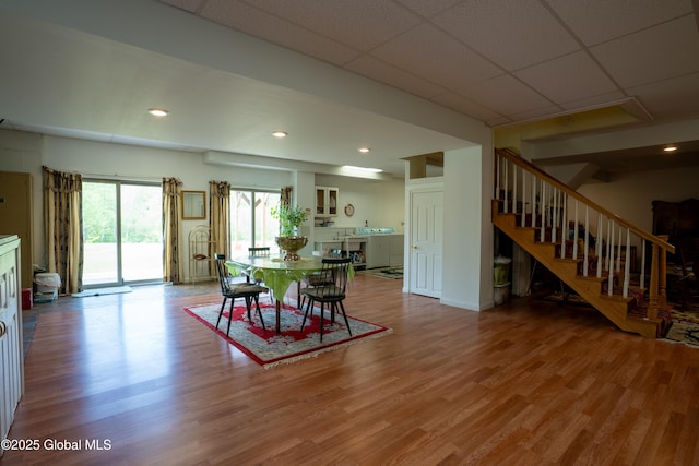 1435 Webster St, Malone, NY 12953 - dining space with stairs, wood finished floors, recessed lighting, and a drop ceiling