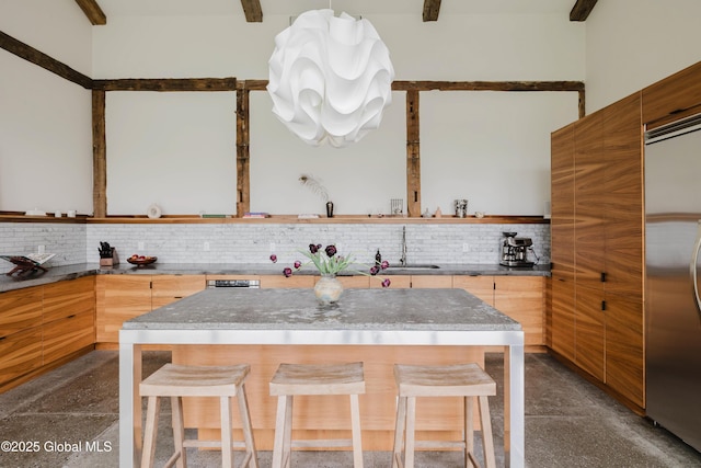 632 Albany Tpke, Chatham, NY 12136 - kitchen featuring open shelves, stainless steel built in fridge, tasteful backsplash, and a breakfast bar area