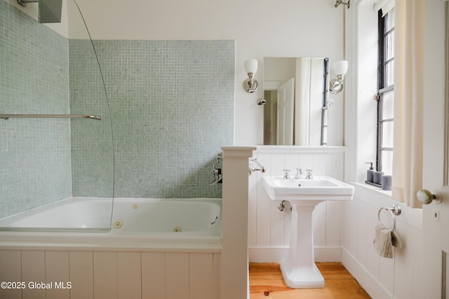 632 Albany Tpke, Chatham, NY 12136 - bathroom with a combined bath / shower with jetted tub and wood finished floors