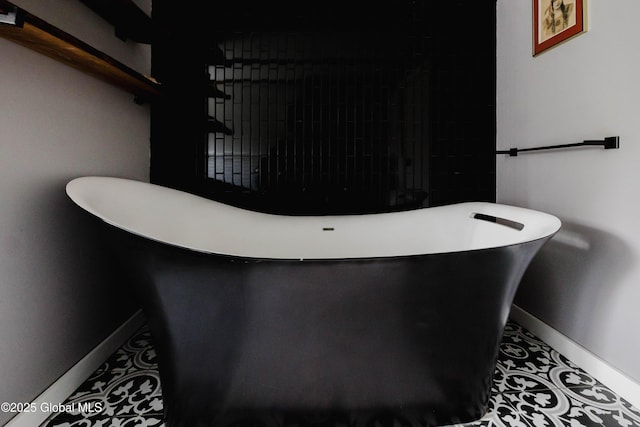 632 Albany Tpke, Chatham, NY 12136 - full bath featuring baseboards, a freestanding bath, and tile patterned floors