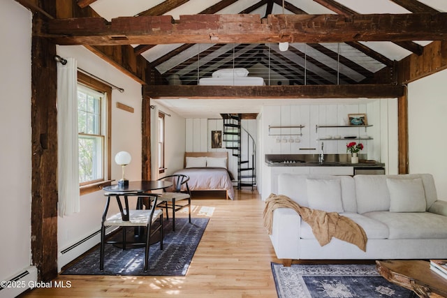 632 Albany Tpke, Chatham, NY 12136 - living room featuring a baseboard radiator and wood finished floors