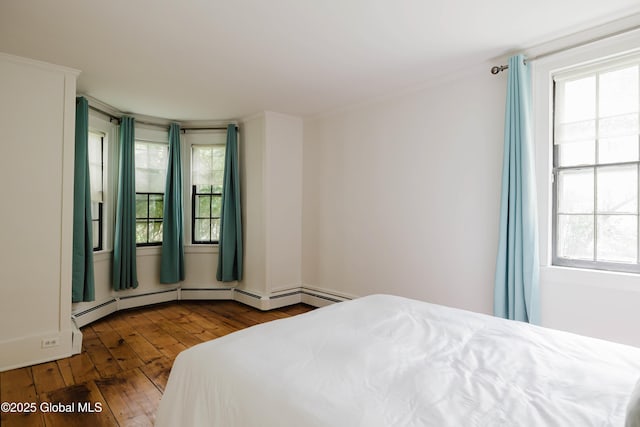 632 Albany Tpke, Chatham, NY 12136 - bedroom featuring hardwood / wood-style flooring and multiple windows