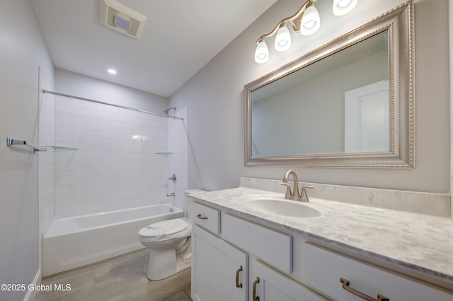 full bath featuring vanity, toilet, shower / tub combination, and tile patterned floors