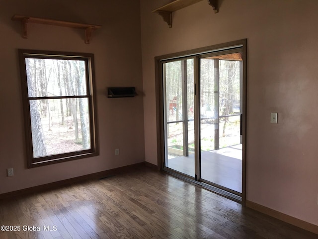 24 Fairmount Dr, Wilton, NY 12831 - unfurnished room with wood finished floors, healthy amount of natural light, and baseboards