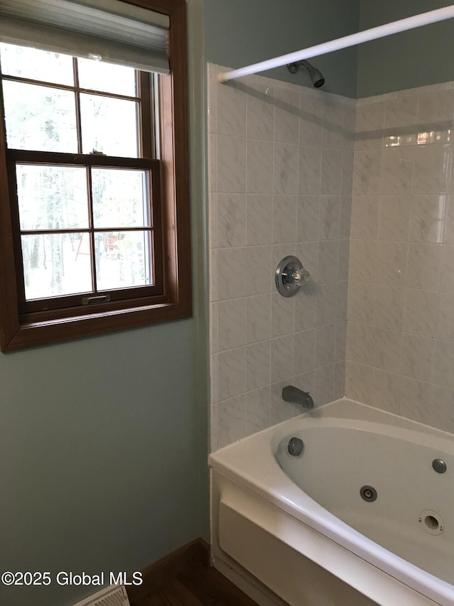 24 Fairmount Dr, Wilton, NY 12831 - bathroom with a combined bath / shower with jetted tub and baseboards